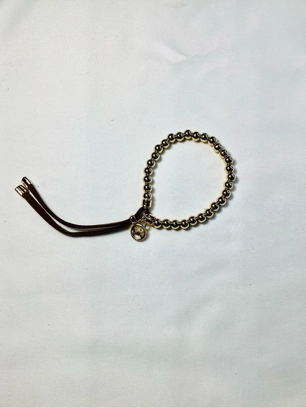 Michael Kors NWT and Dust Bag Gold-Tone Beaded Brown Suede Logo Charm Bracelet